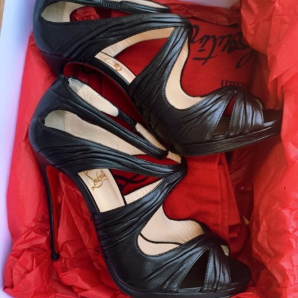 Red bottoms Christian Louis Vuitton (used)